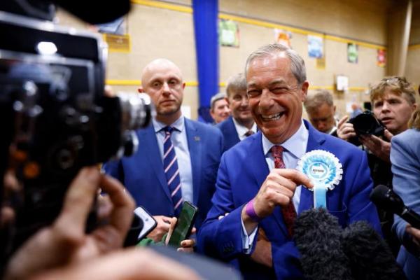 Pemimpin Partai Reformasi Inggris Nigel Farage bereaksi saat berbicara kepada media di Clacton-on-Sea, Inggris, 5 Juli 2024. REUTERS 