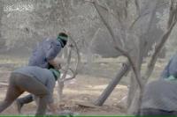 Gambar diam yang diambil dari video yang dirilis oleh Hamas menunjukkan mereka menembakkan mortir ke pasukan Israel pada 7 November 2023 di Gaza. Handout via REUTERS