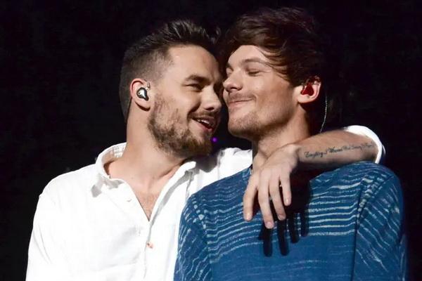 Liam Payne dan Louis Tomlinson saat masih bersama di boy band One Direction. (FOTO: FILM MAGIC)  