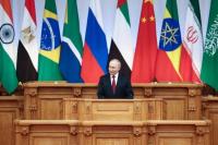 Presiden Rusia Vladimir Putin berpidato di Forum Parlemen BRICS di Saint Petersburg, Rusia, 11 Juli 2024. Handout via REUTERS