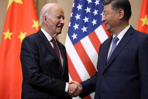 Joe Biden dan Xi Jinping saat menghadiri KTT APEC, Lima, 16 November 2024. REUTERS 