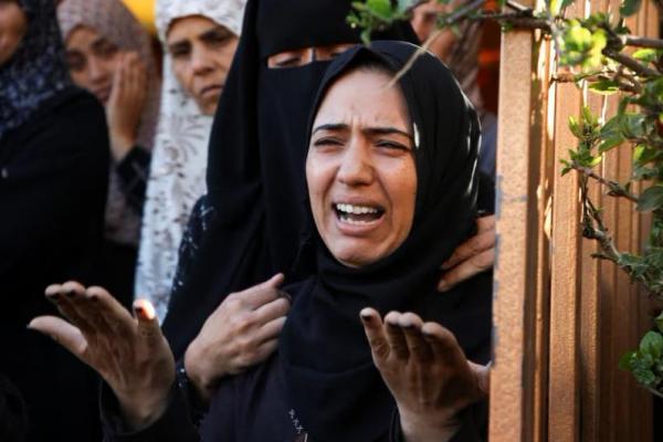 Seorang wanita berduka selama pemakaman warga Palestina di Khan Younis di Jalur Gaza selatan, 21 November 2024. REUTERS 