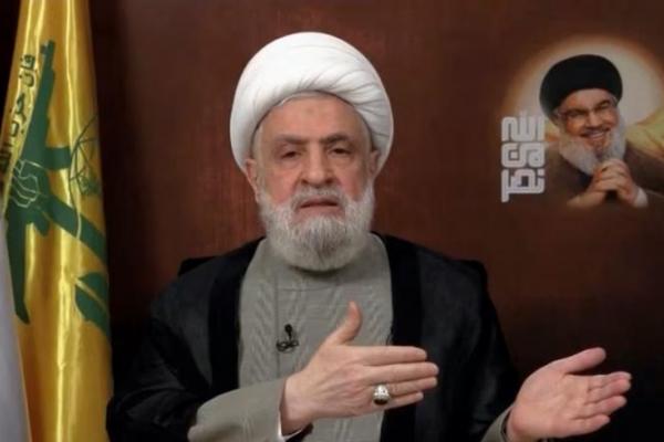 Pemimpin Hizbullah Lebanon Sheikh Naim Qassem menyampaikan pidato dari lokasi yang tidak diketahui, 29 November 2024. Reuters TV via REUTERS 