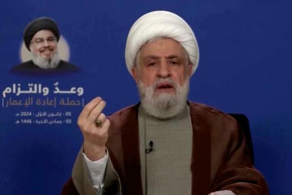 Pemimpin Hizbullah Lebanon Sheikh Naim Qassem menyampaikan pidato dari lokasi yang tidak diketahui, dirilis pada 5 Desember 2024. Foto via REUTERS 