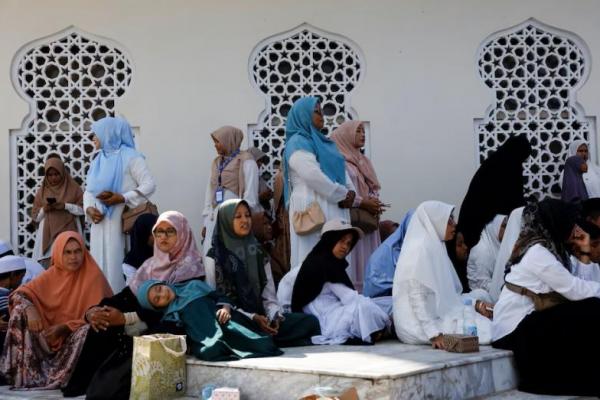 Warga menghadiri salat berjamaah untuk memperingati 20 tahun tsunami Samudra Hindia di Masjid Raya Baiturrahman, Banda Aceh, Aceh, Indonesia, 26 Desember 2024. REUTERS 